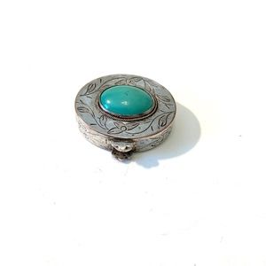 Silver and turquoise Native American pill box.